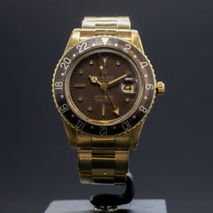 Rolex GMT-MASTER en Or Jaune réf.1675 "No Crown Guard" - L'Atelier du Temps