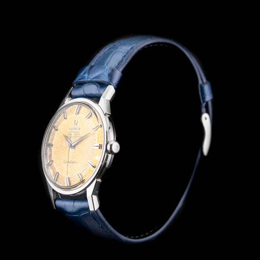 Omega Constellation Rusty 1968 cadran Pie Pan patiné et boîtier acier sur bracelet cuir bleu